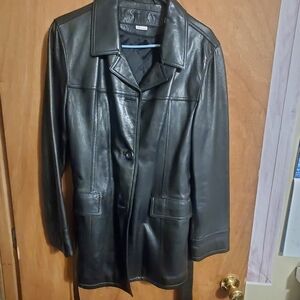TRIBAL BLACK LEATHER COAT SZ 10. BUTTON UP .TIE WAIST.